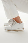 Lifestyle view of Alfie & Evie Fashion Sneaker - Style Hosting in white