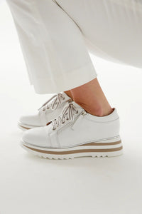 Lifestyle view of Alfie & Evie Fashion Sneaker - Style Hosting in white