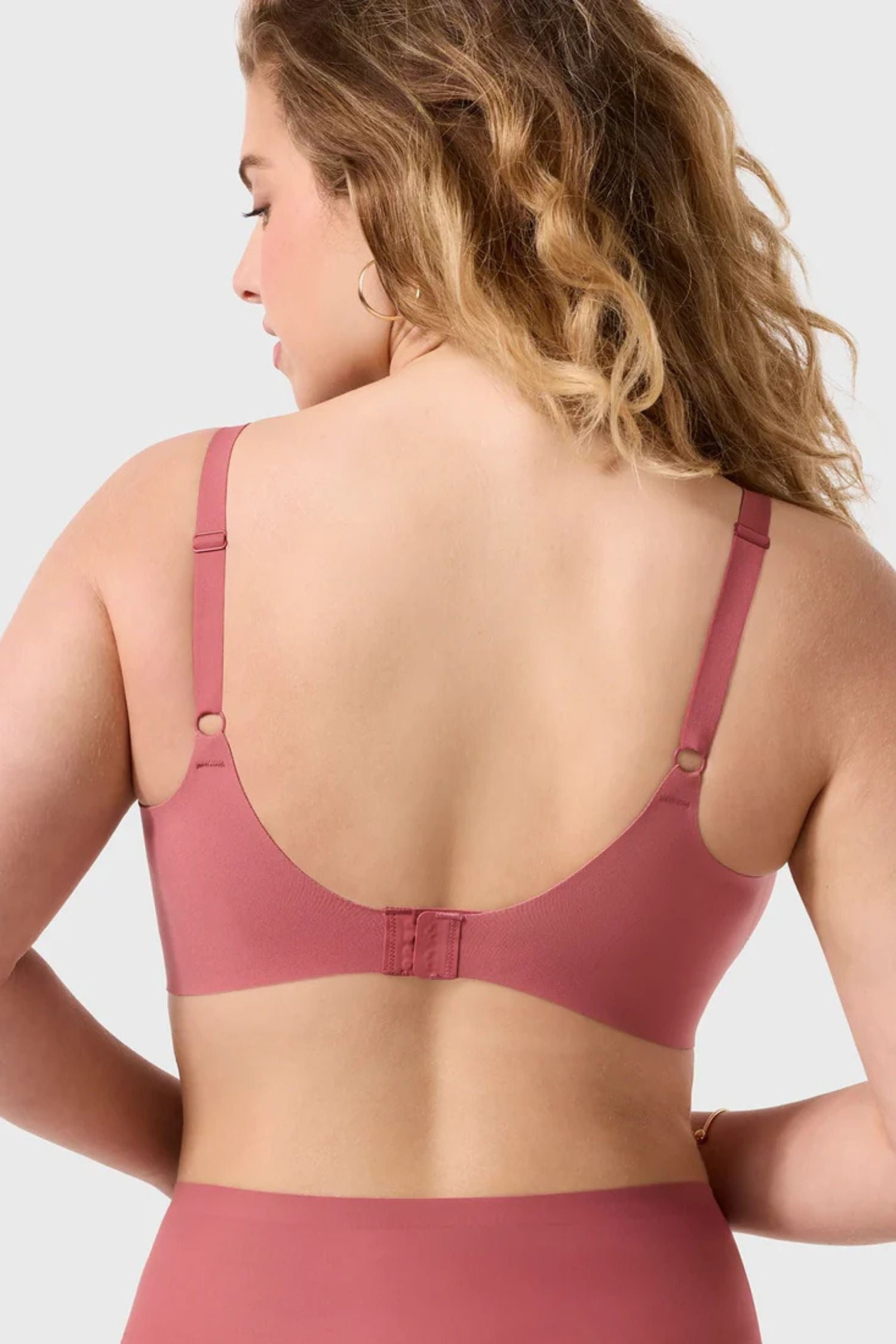 Back view of Evelyn and Bobbie Beyond Wirefree Bra in pink canyon