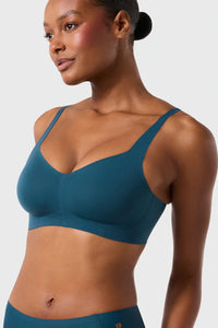 Front and side view of Evelyn and Bobbie Beyond Wirefree Bra in deep tide