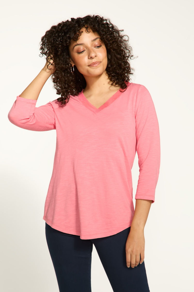 Front view of FDJ V-Neck 3/4 Sleeve Top - Style 3148476 in coral