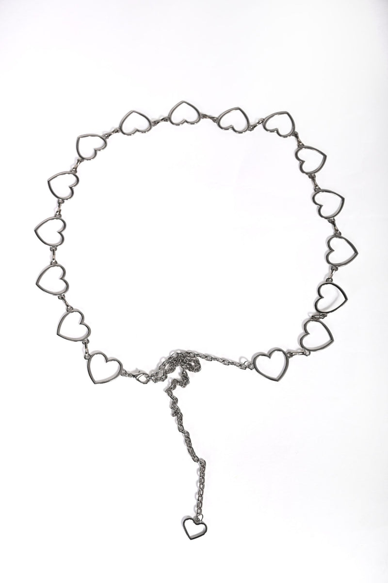 Overhead view of Frank Lyman Heart Chain Belt - Style A26604 in silver