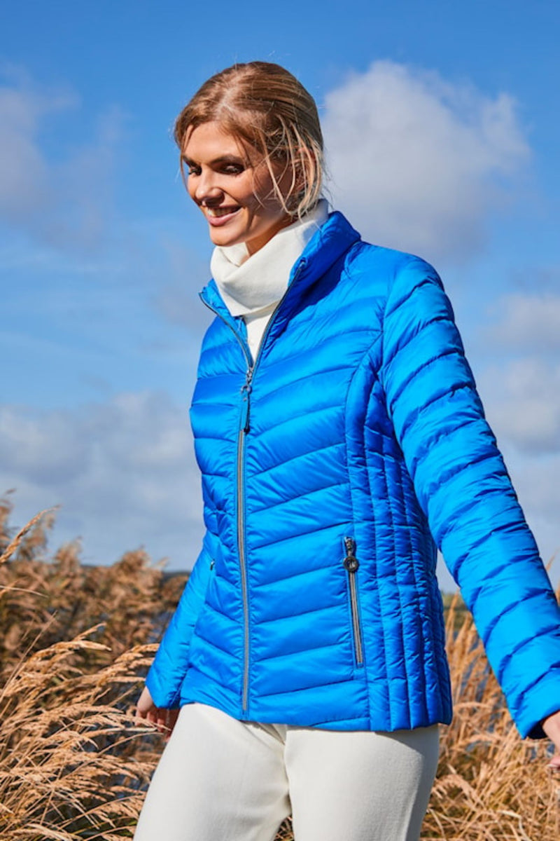Side view of Fransden Down Jacket - Style 528-588-0 in palace blue, lifestyle pic