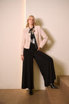 Lifestyle view of Joseph Ribkoff Bouclé Collarless Jacket with Buttons - Style 254903 in rose