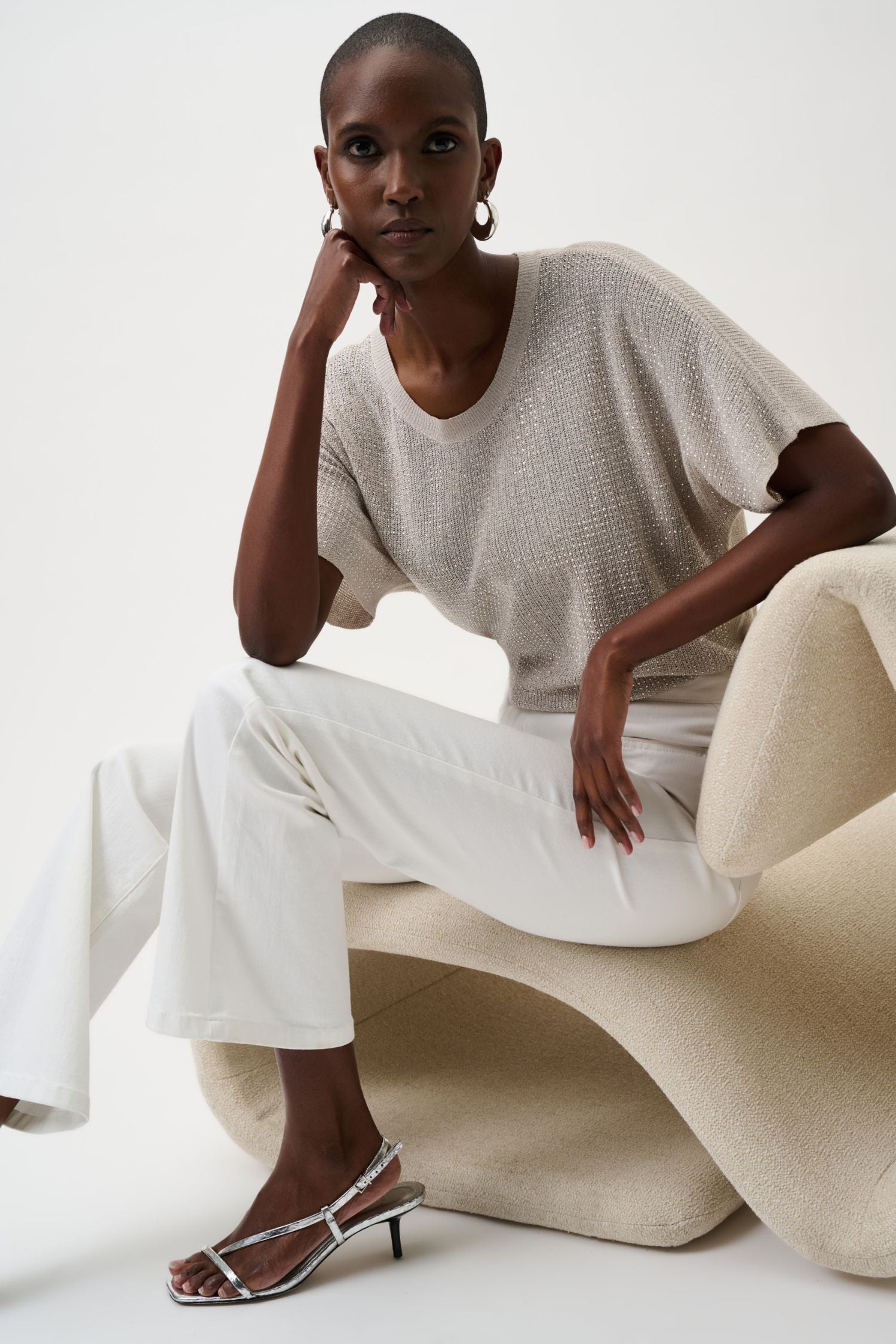 Seated view of Joseph Ribkoff Brooke Bootcut Jean - Style 251967 in white