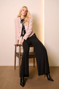 Lifestyle view of Joseph Ribkoff Moss Crepe Knit Flared Pants - Style 254178-BLK