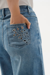 Back pocket view of Joseph Ribkoff Repreve® Denim Wide Leg Crop Jeans with Embroidery – Style 262915