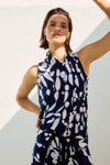 Lifestyle front view of Joseph Ribkoff Silky Knit Abstract Print Sleeveless Top - Style 251251