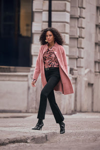 Lifestyle view of Joseph Ribkoff Textured Satin Animal-Print Cowl Neck Top - Style 263003