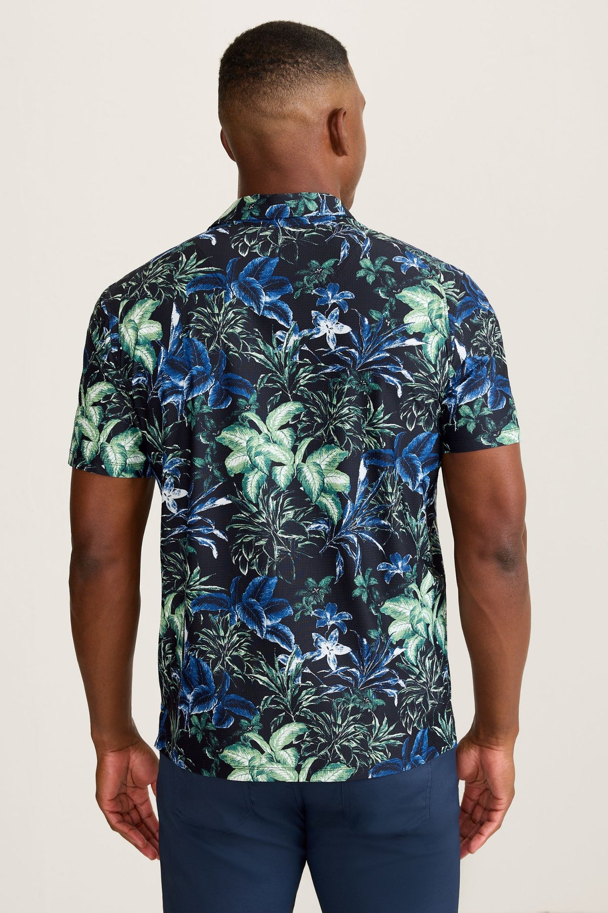 Back view of Tommy Bahama Pebble Coast Canopy Floral IslandZone® Polo - Style ST227625