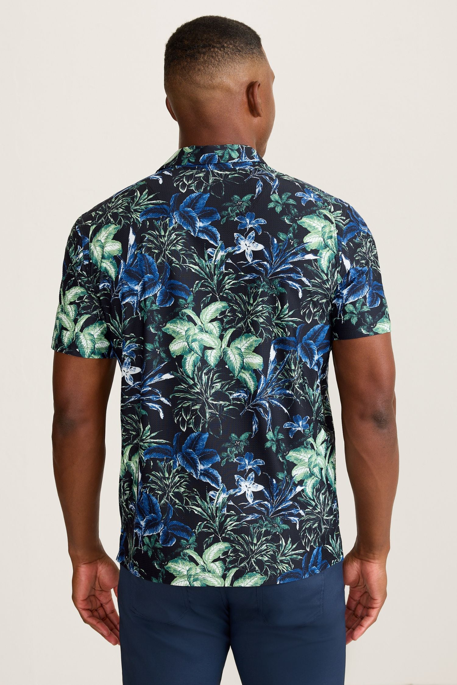 Back view of Tommy Bahama Pebble Coast Canopy Floral IslandZone® Polo - Style ST227625